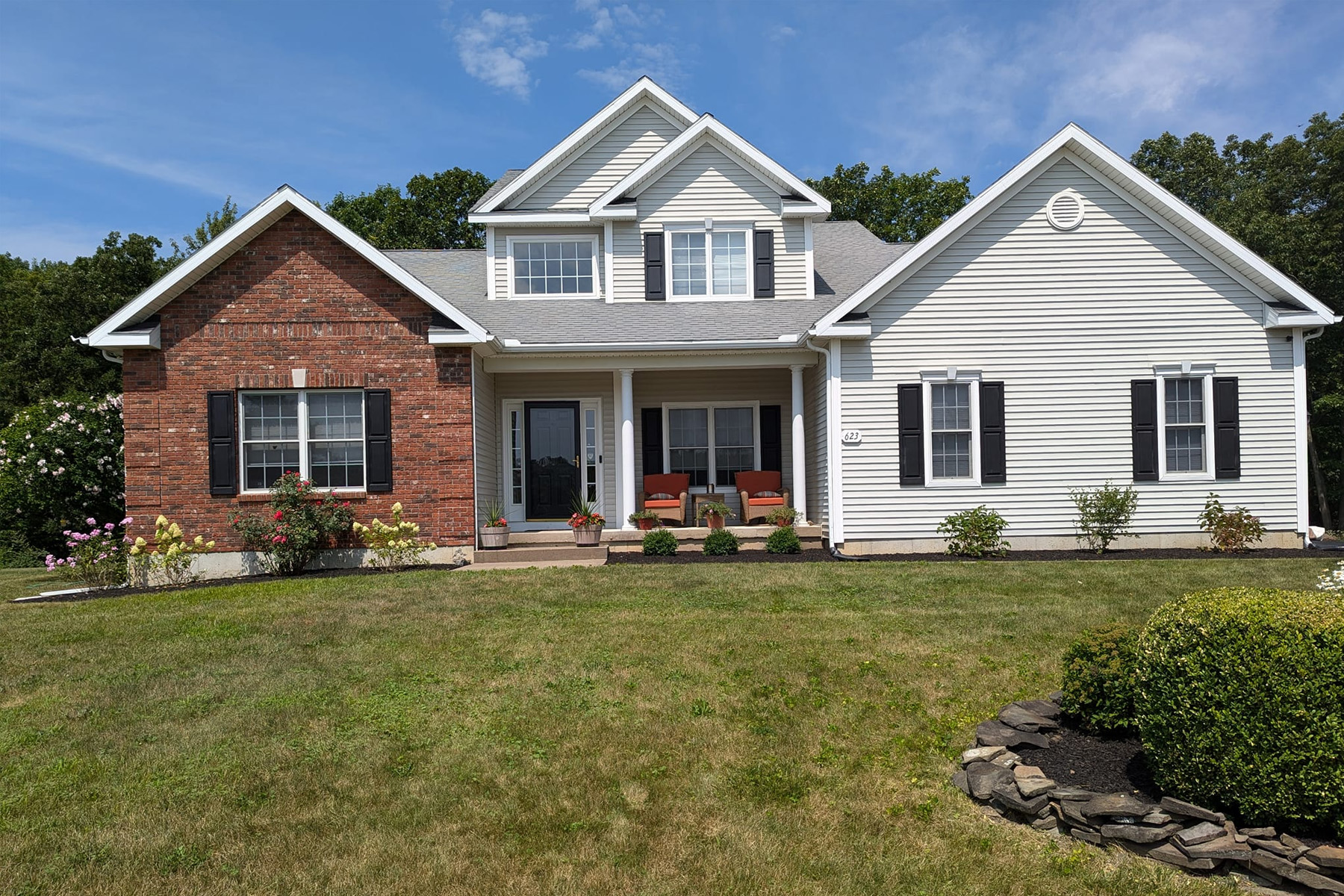 Thumbnail of Installation progress photo of completed retaining wall around pool