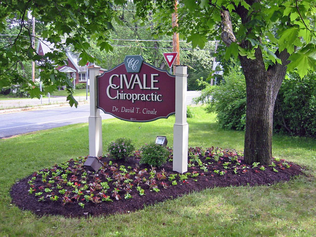 The newly completed plantbed with fresh mulch under the Civale Chiropractic sign