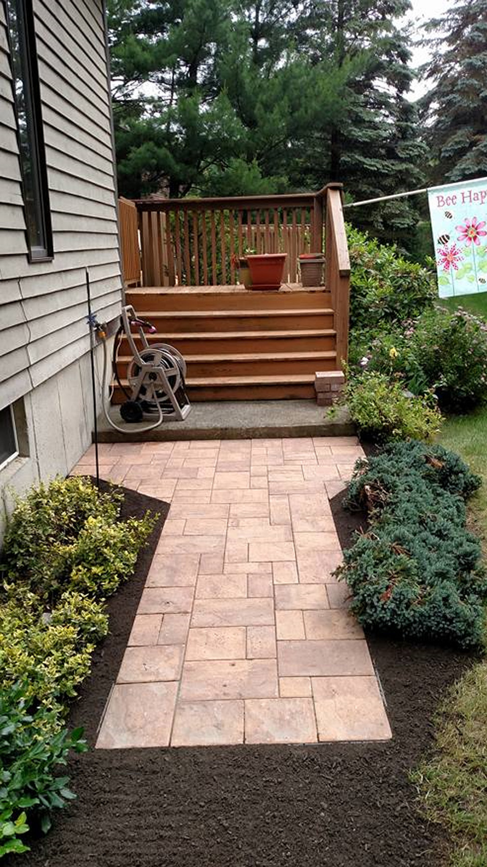 Image of completed stone walkway and landscaping cleanup